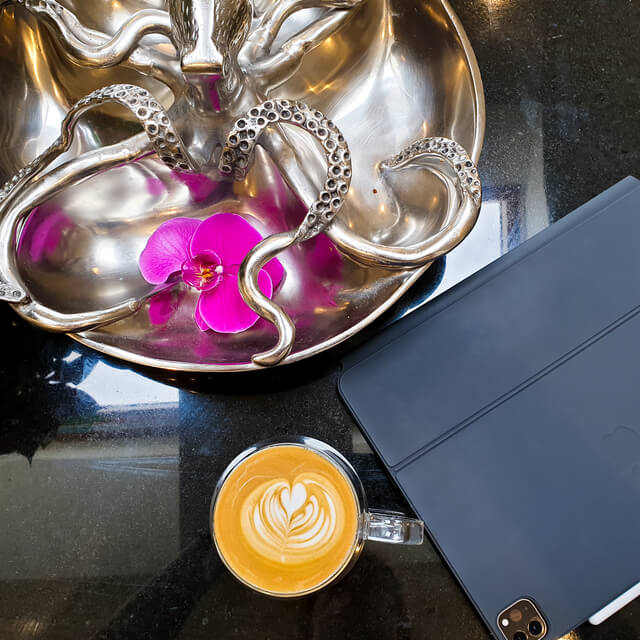 latte art with flower and ipad